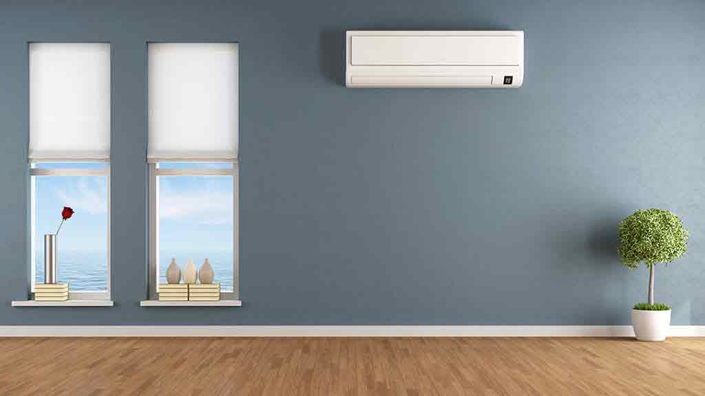 air conditioner next to vertical windows