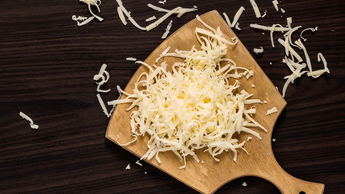 Avoid pre-shredded cheese to save money