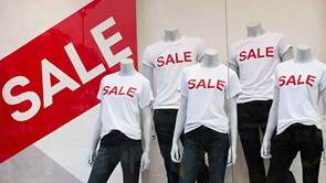 mannequins wearing shirts saying sale