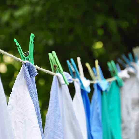 washed clothes drying on line square