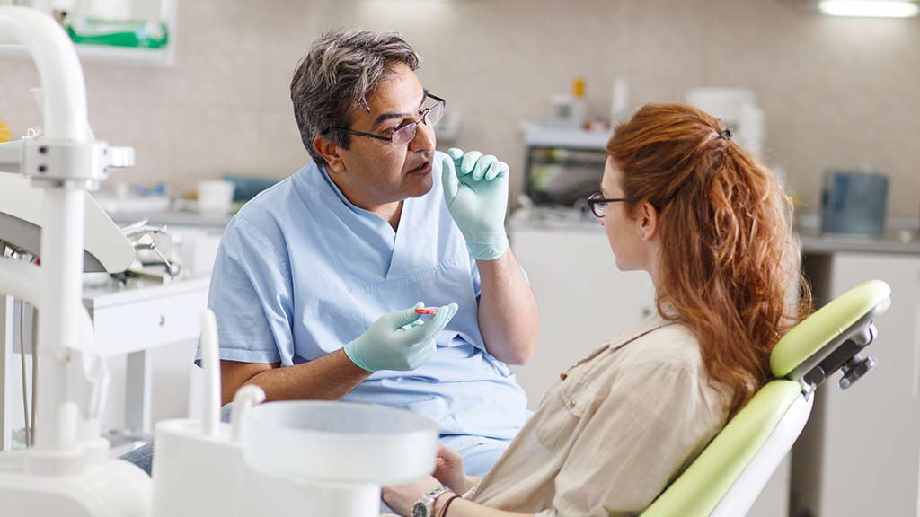  Woman getting dental treatment