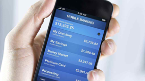 hand holding phone with mobile banking app