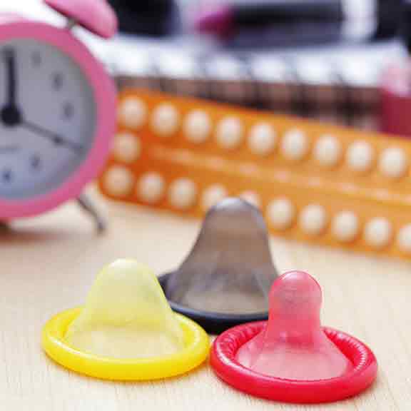 condoms clock and contraception pills square