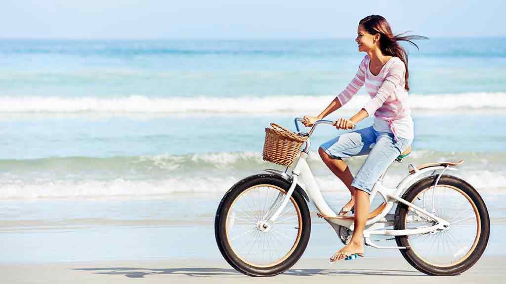 woman rides bike