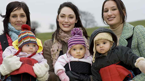 three mums with their babys in carriers