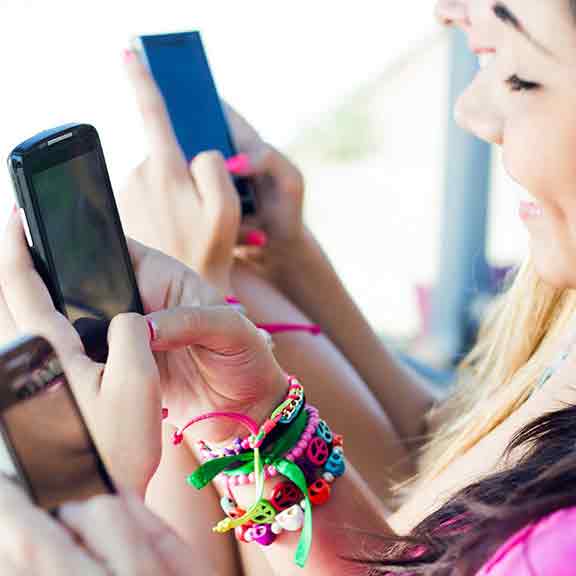 women using mobile phones square