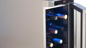 wine fridge open with bottles