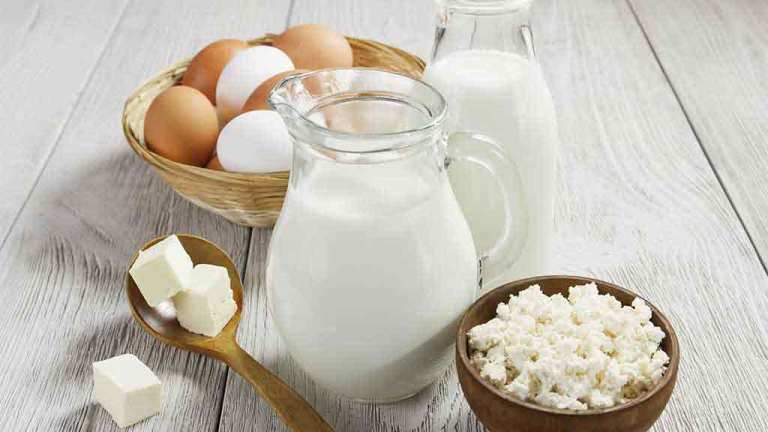 milk eggs and healthy food on a table