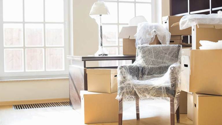 room of packed contents and furniture