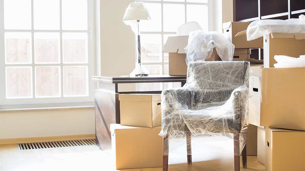 room of packed contents and furniture