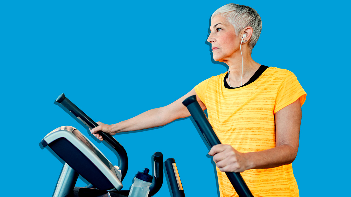 woman using cross trainer