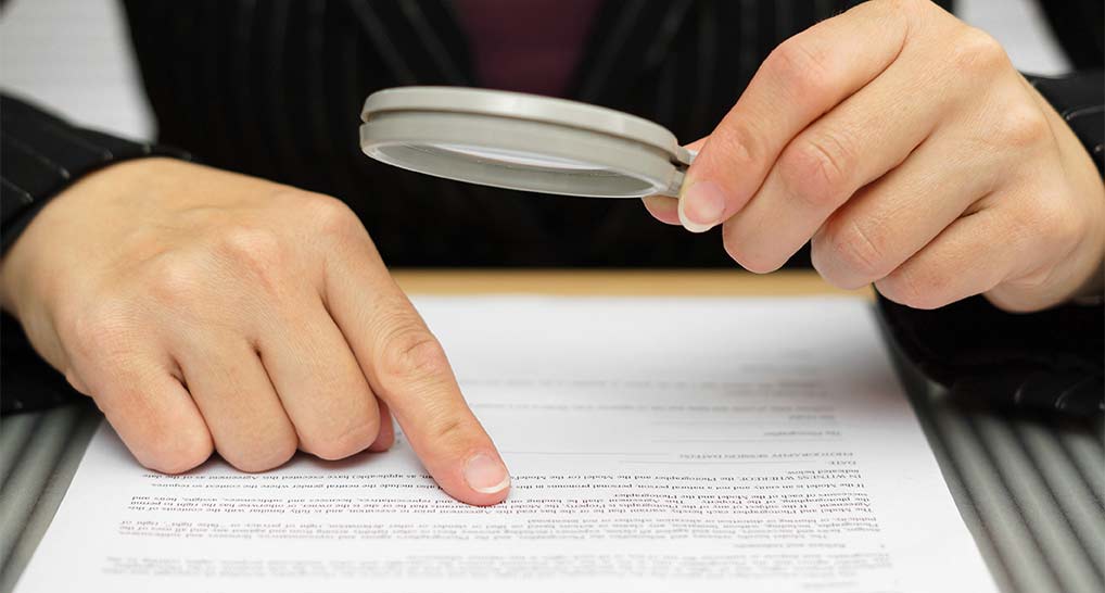 woman-reading-fine-print