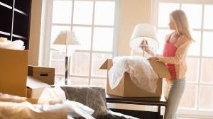 woman_packing_unpacking_boxes