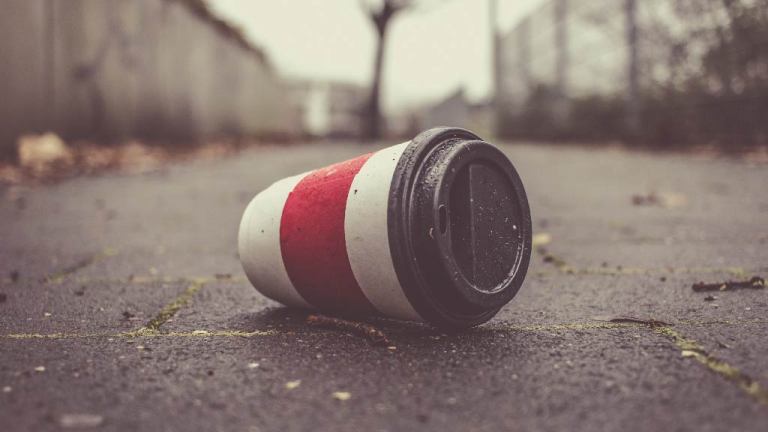 coffee cup left on footpath