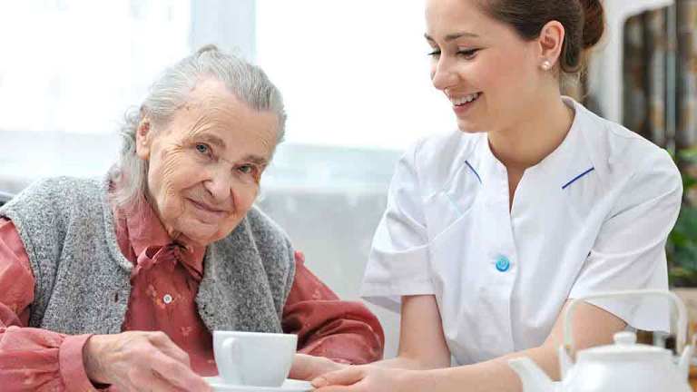 elderly woman with nurse