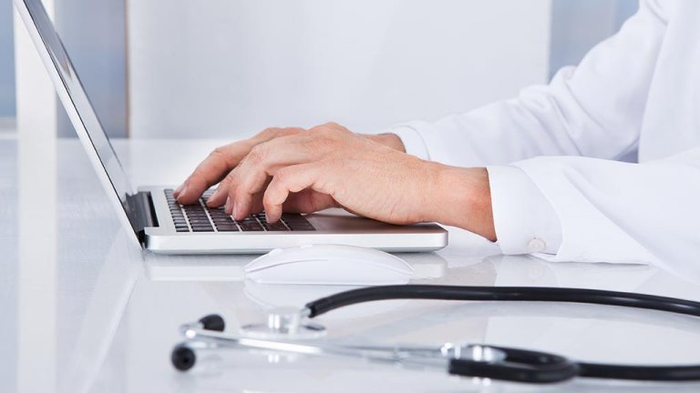 doctor on laptop
