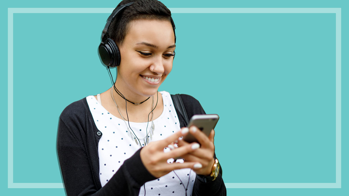 woman listening to music through phone