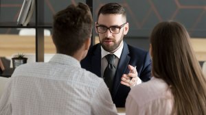 couple meeting with mortgage broker