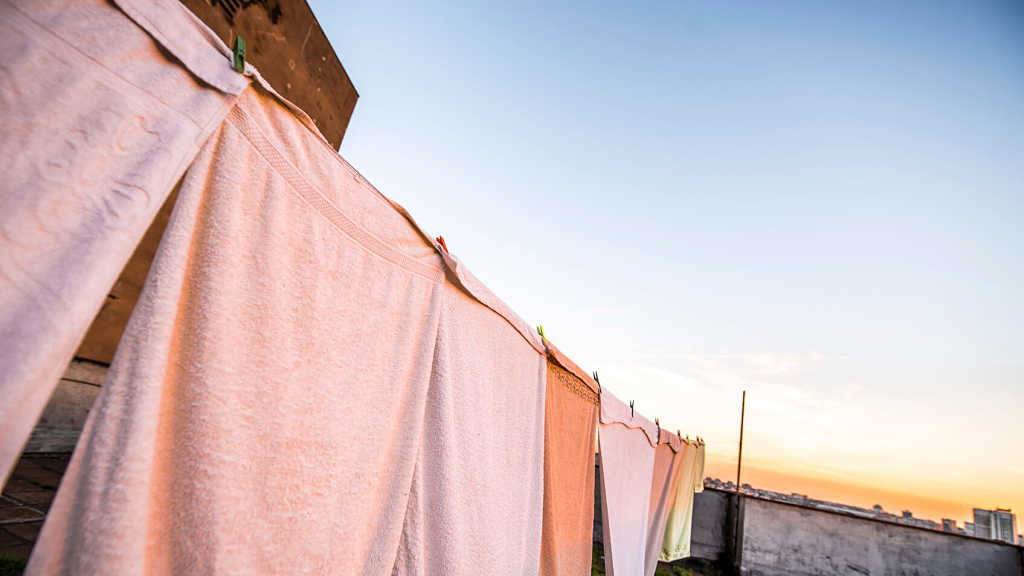 coloured towels drying on line