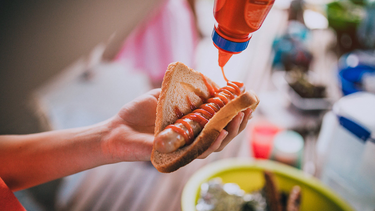 tomato sauce on sausage sizzle