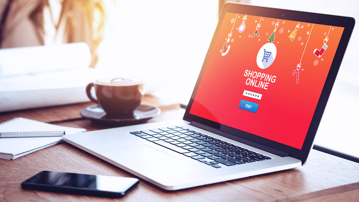 laptop with online shopping for presents LEAD