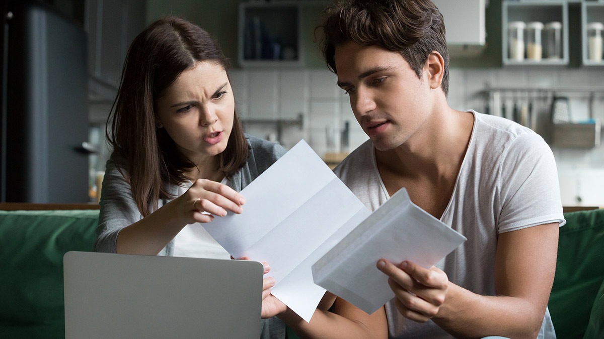 young_people_looking_at_eviction_notice