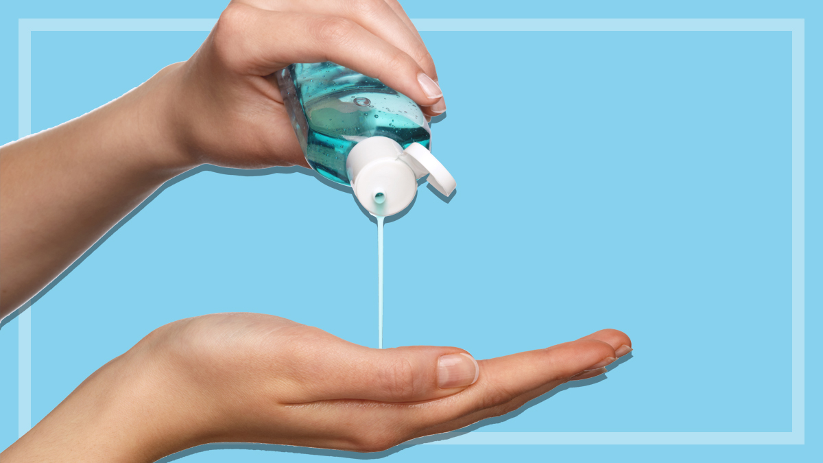 person applying hand sanitiser
