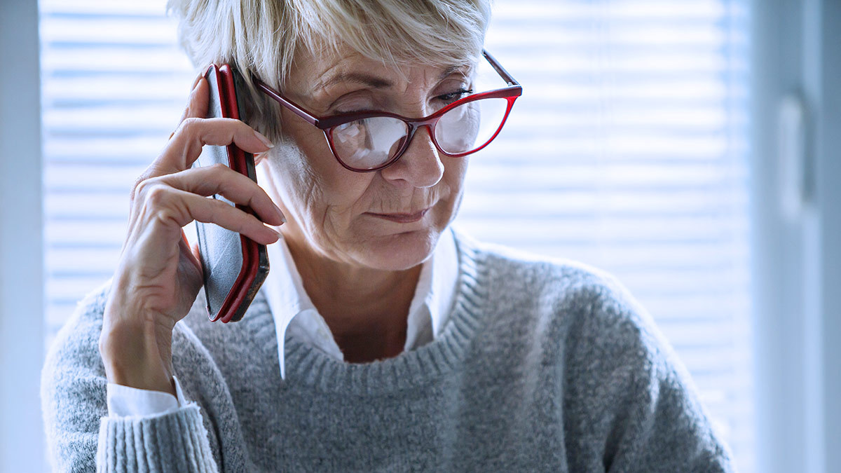 person_answering_call_on_smartphone