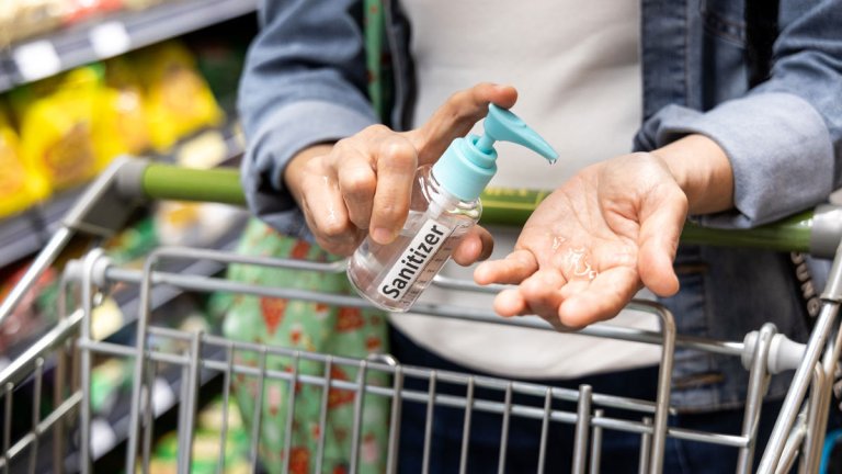 using hand sanitiser at the supermarket coronavirus