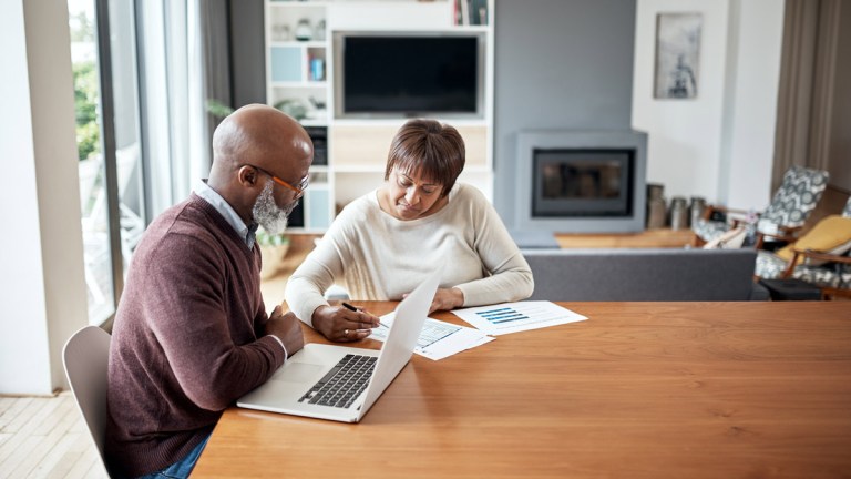 couple_going_over_number_of_superannuation_fund