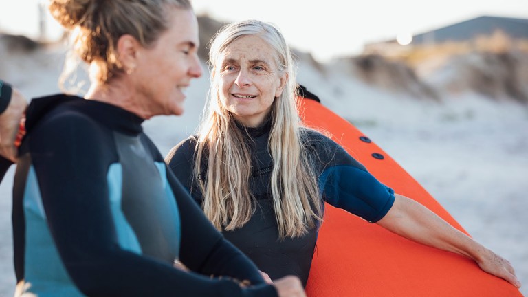 two_seniors_preparing_to_go_surfing
