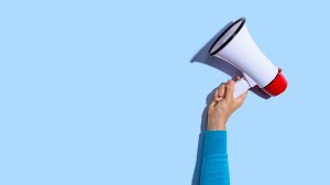 person holding megaphone