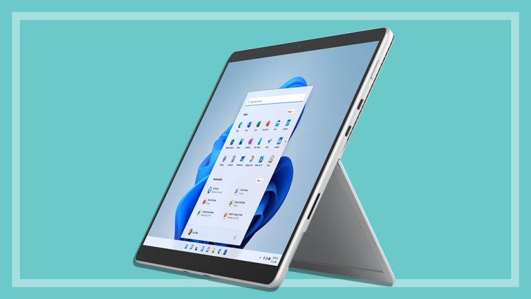 Microsoft Surface Pro 8 on a teal background