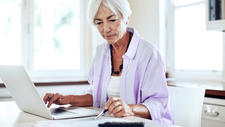 person holds windfarm in their hands