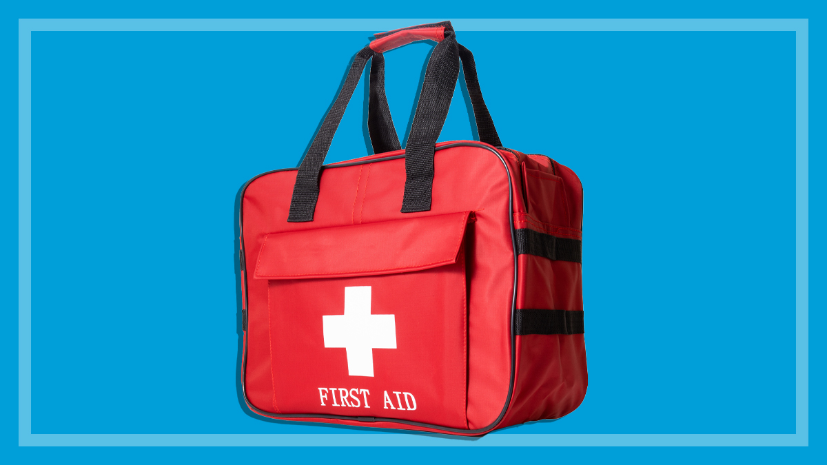 red first aid kit on a blue background