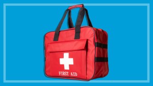 red first aid kit on a blue background