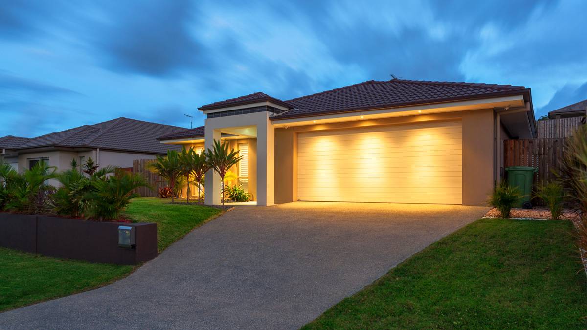 home lit up at night