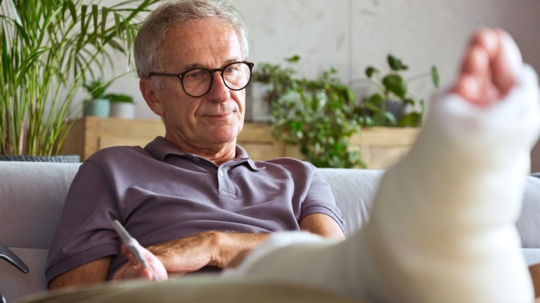 older man with a broken leg