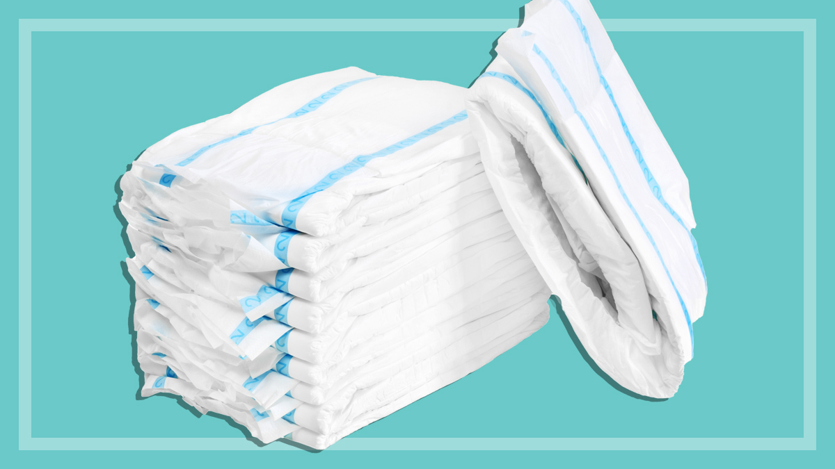 white incontinence pads on a teal background