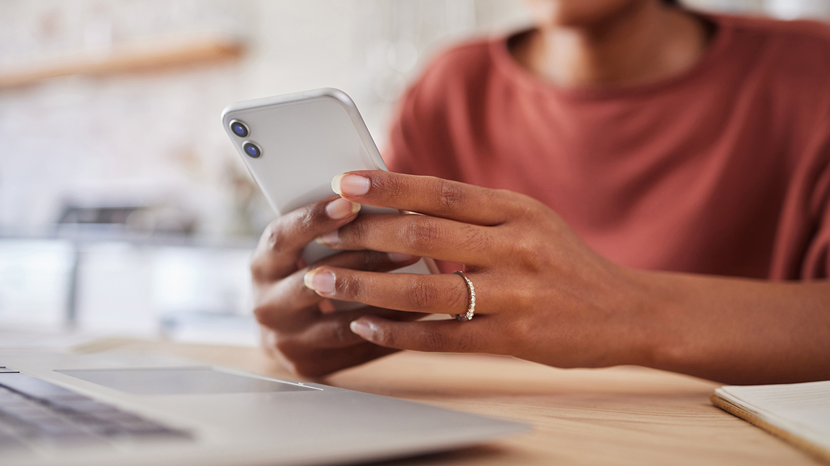 person_calling_company_on_smartphone