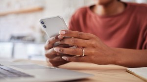 person_calling_company_on_smartphone