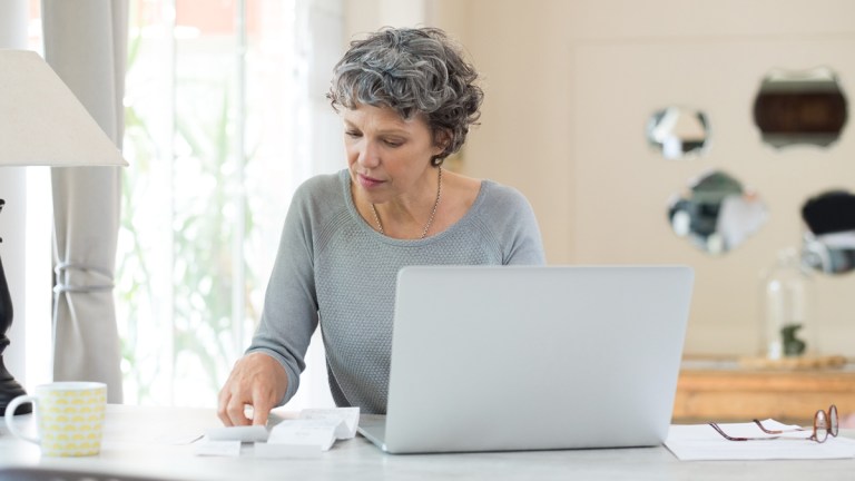 woman_looking_over_finances_superannuation