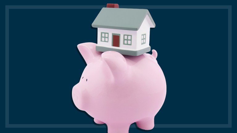 piggybank with model house on top