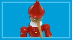 pinocchio_puppet_looking_down_at_article_below