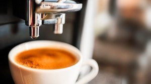 closeup_of_a_freshly_made_espresso_under_a_manual_coffee_machine