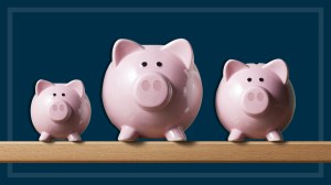 different_size_piggy_banks_on_navy_blue