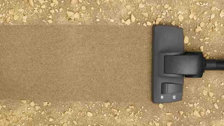 vacuum cleaner cleaning messy carpet