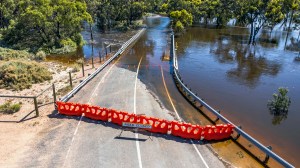 flood_waters_over_australian_road