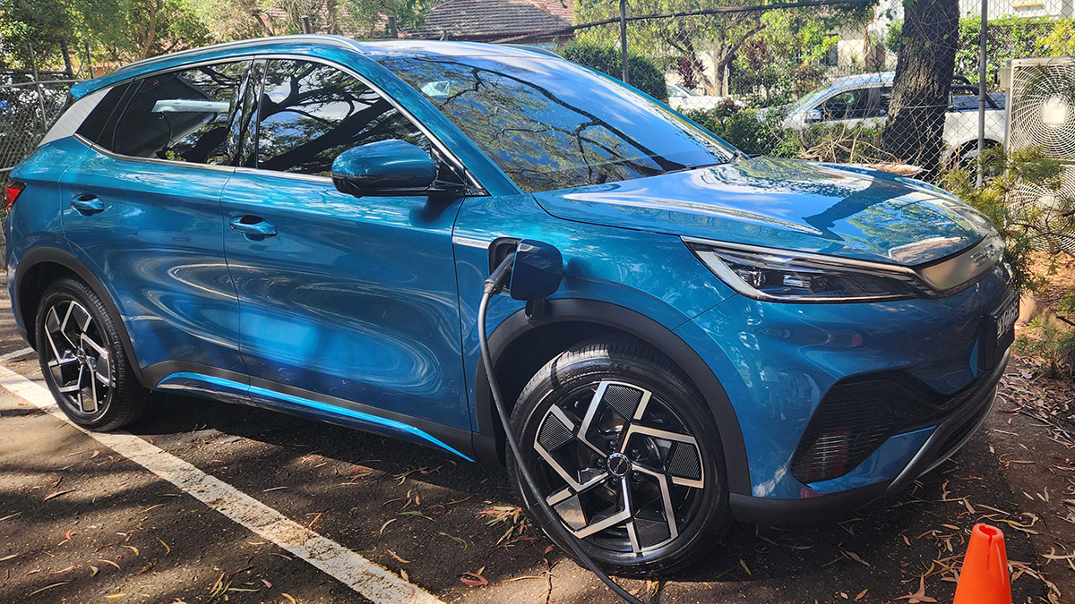 Blue BYD Atto 3 charging in choice car park