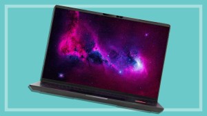 Venom BlackBook Zero 14 Phantom G9 Platinum Edition laptop on a teal background